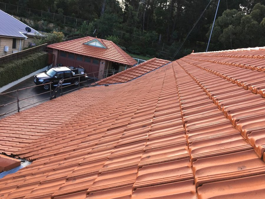 Freshly re-coated terracotta roof