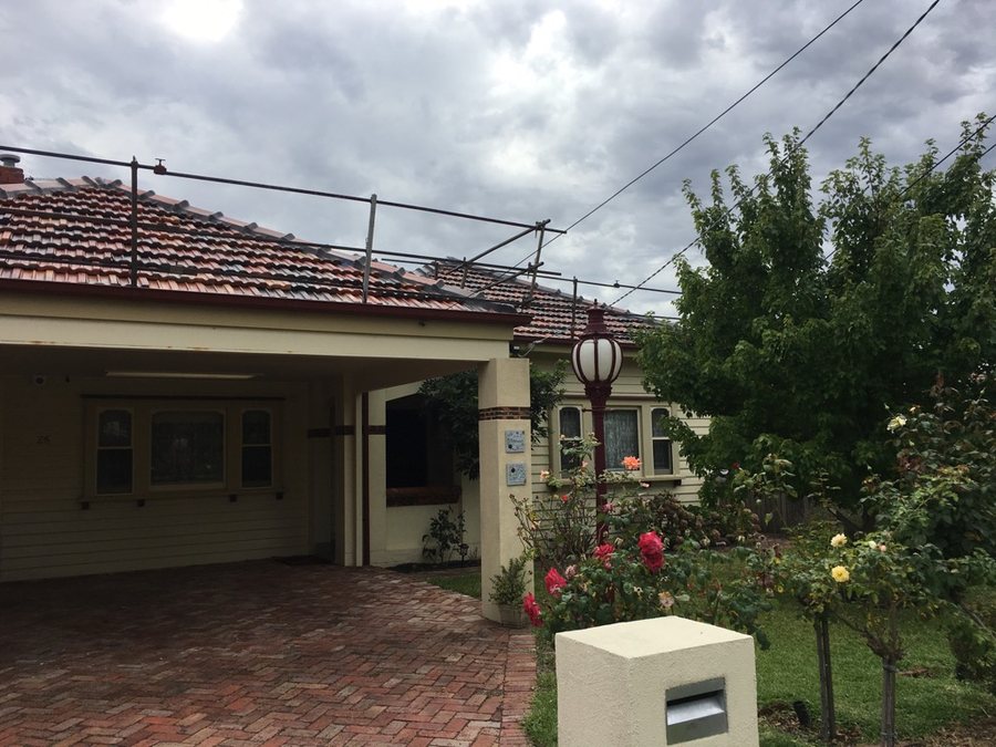Charcoal restored tiled roof