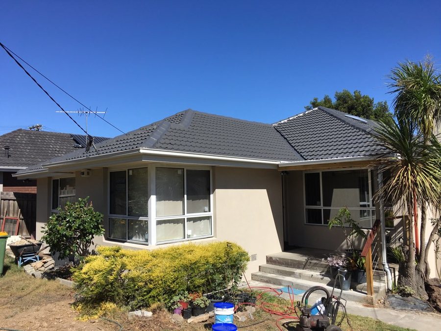 Restored tiled roof with solar panels